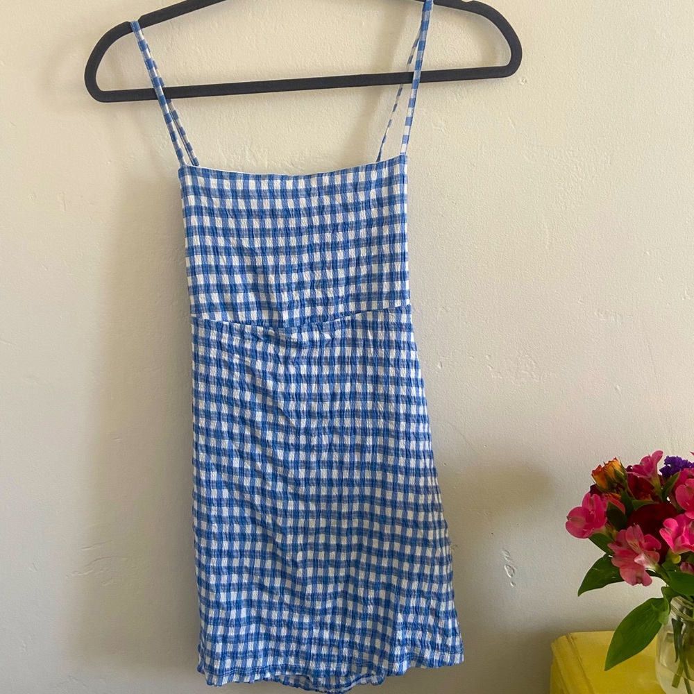 Checkered dress with adjustable, cross-cross back straps. From Ibiza, Spain!